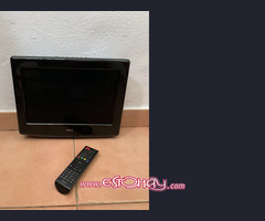Tv con mando a distancia más soporte Tv
